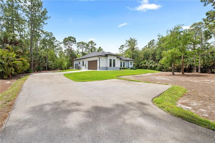 Property Photo:  348 14th Ave NE  FL 34120 