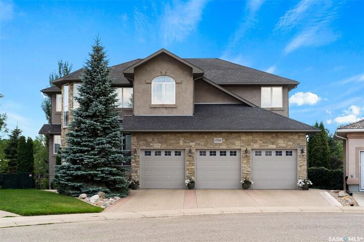 Property Photo: 1514 Lakeridge Drive N SK S4X 4L5