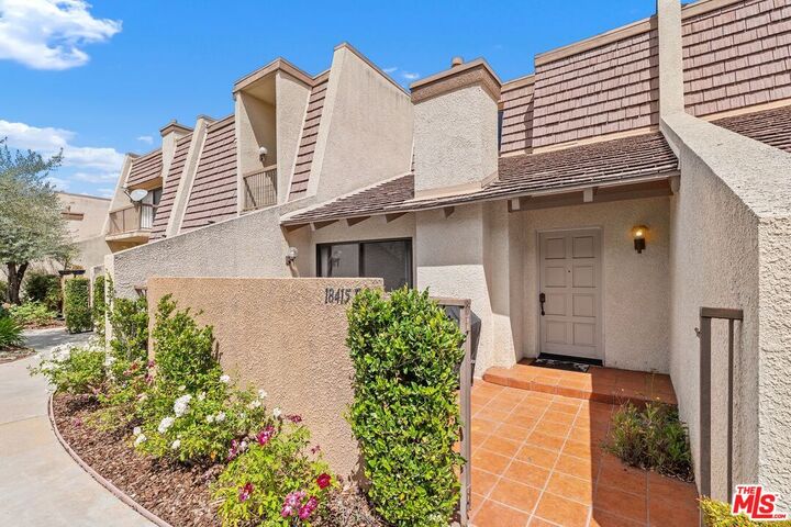 Property Photo:  18415 Collins St  CA 91356 