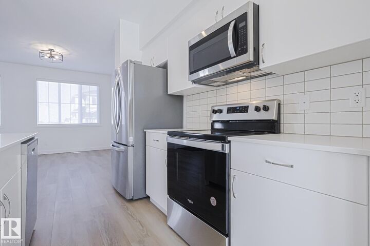 Property Photo: 6343 King Wynd SW AB T6W 5P1