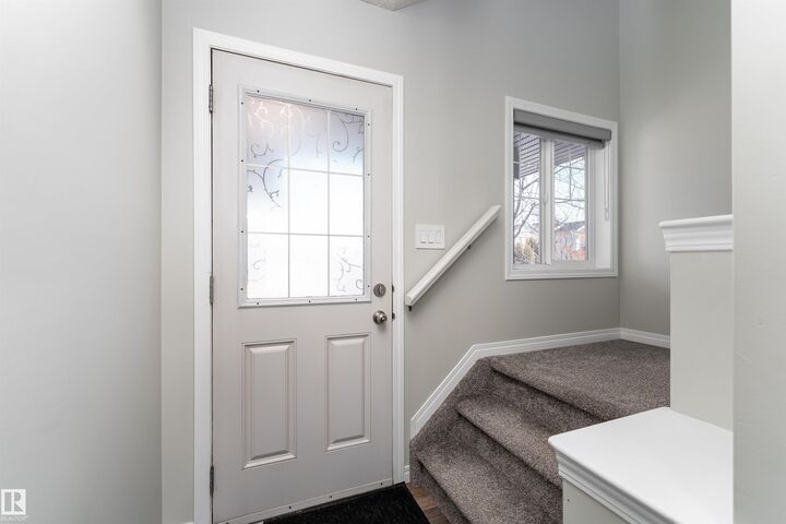 Property Photo:  5911 8 Avenue SW  AB T6X 0G5 