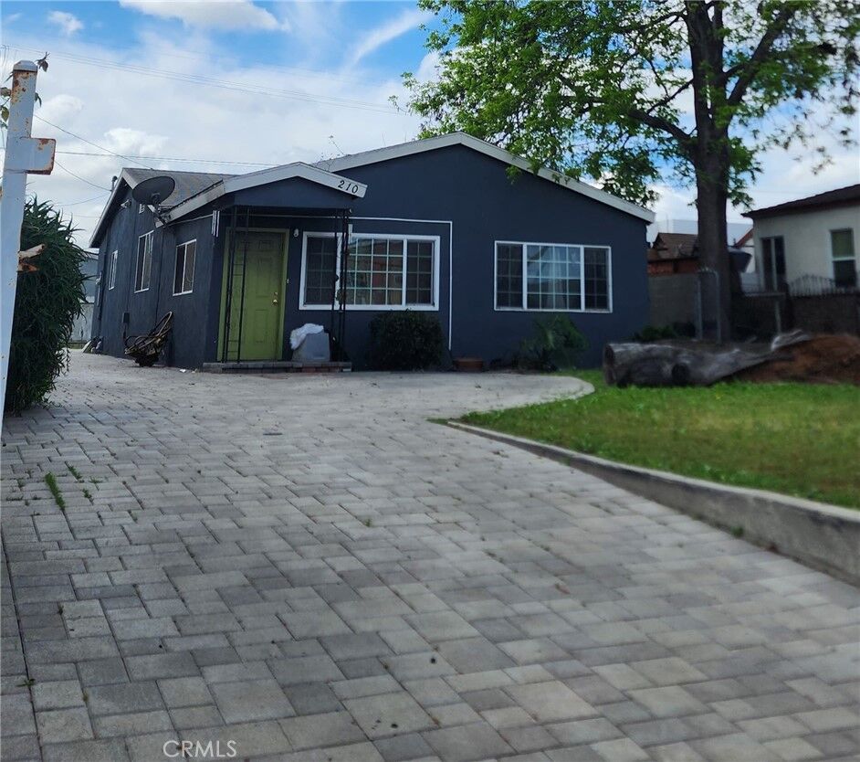 Property Photo:  210 W 113th  CA 90061 