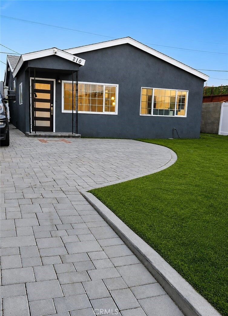 Property Photo:  210 W 113th  CA 90061 