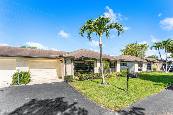 Property Photo:  4922 Dovewood Road B  FL 33436 