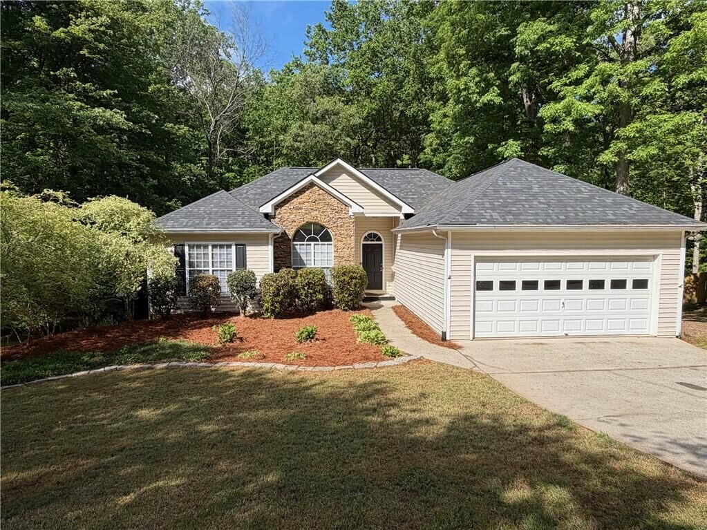 Property Photo:  7080 Shady Oak Lane  GA 30040 