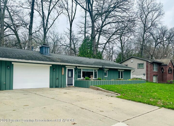 Property Photo:  6275 Lake Drive  MI 48840 