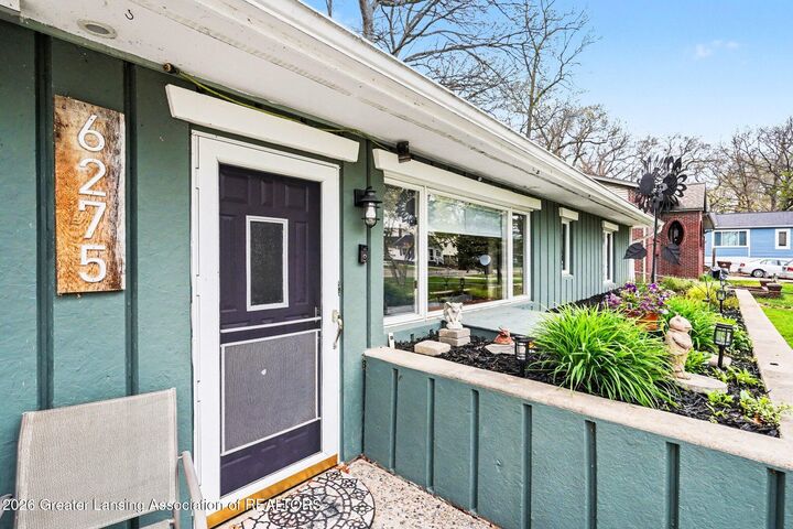 Property Photo:  6275 Lake Drive  MI 48840 