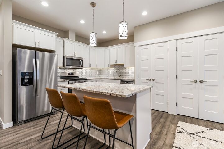 Property Photo:  5683  Sunstone Place 102  WA 98248 