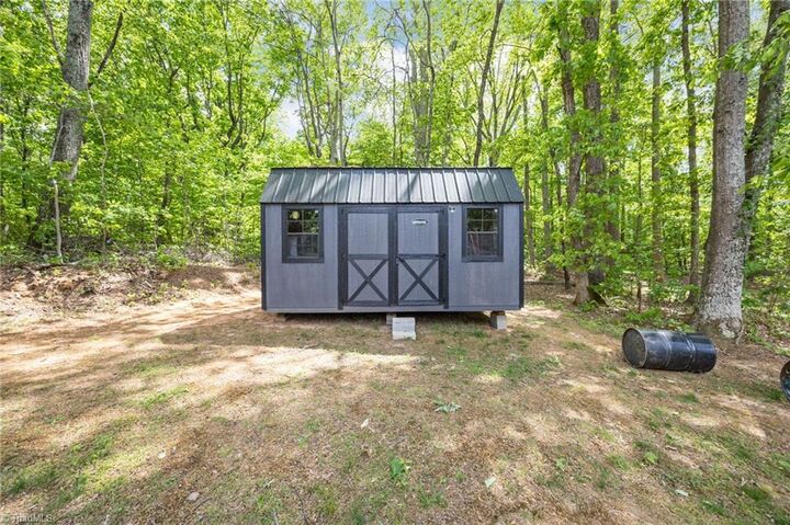 Property Photo:  5124 Tall Tree Drive  NC 27105 