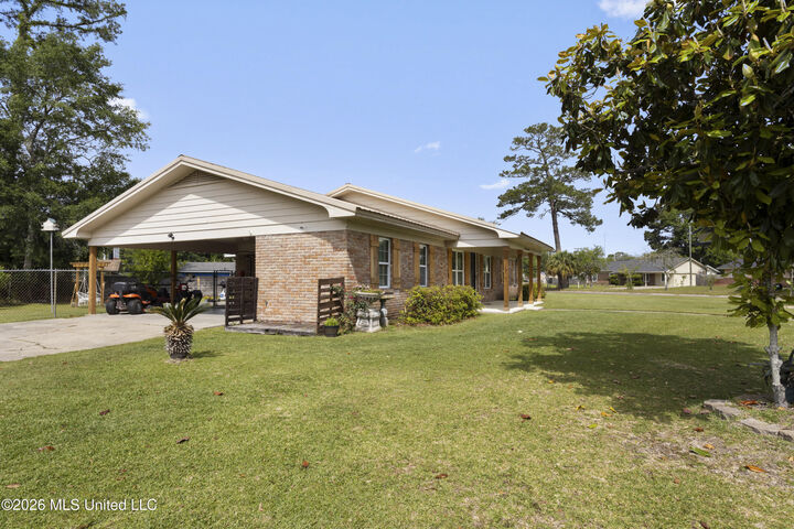 Property Photo:  13101 Cambridge Boulevard  MS 39564 
