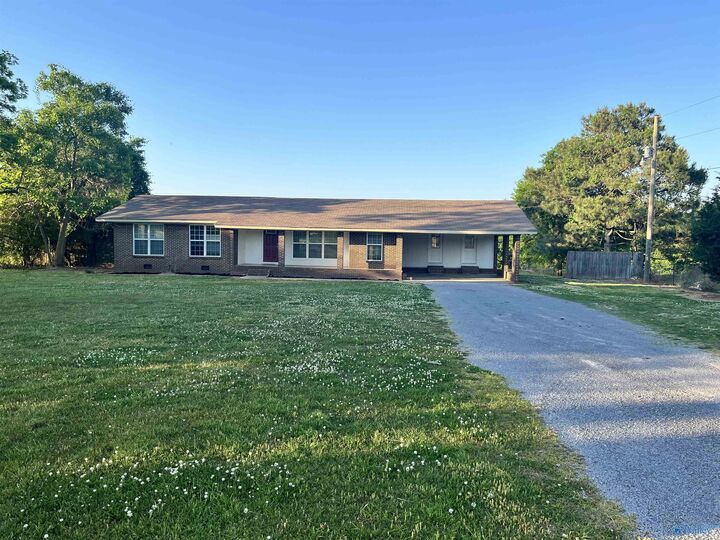 Property Photo:  5668 Hustleville Road  AL 35951 