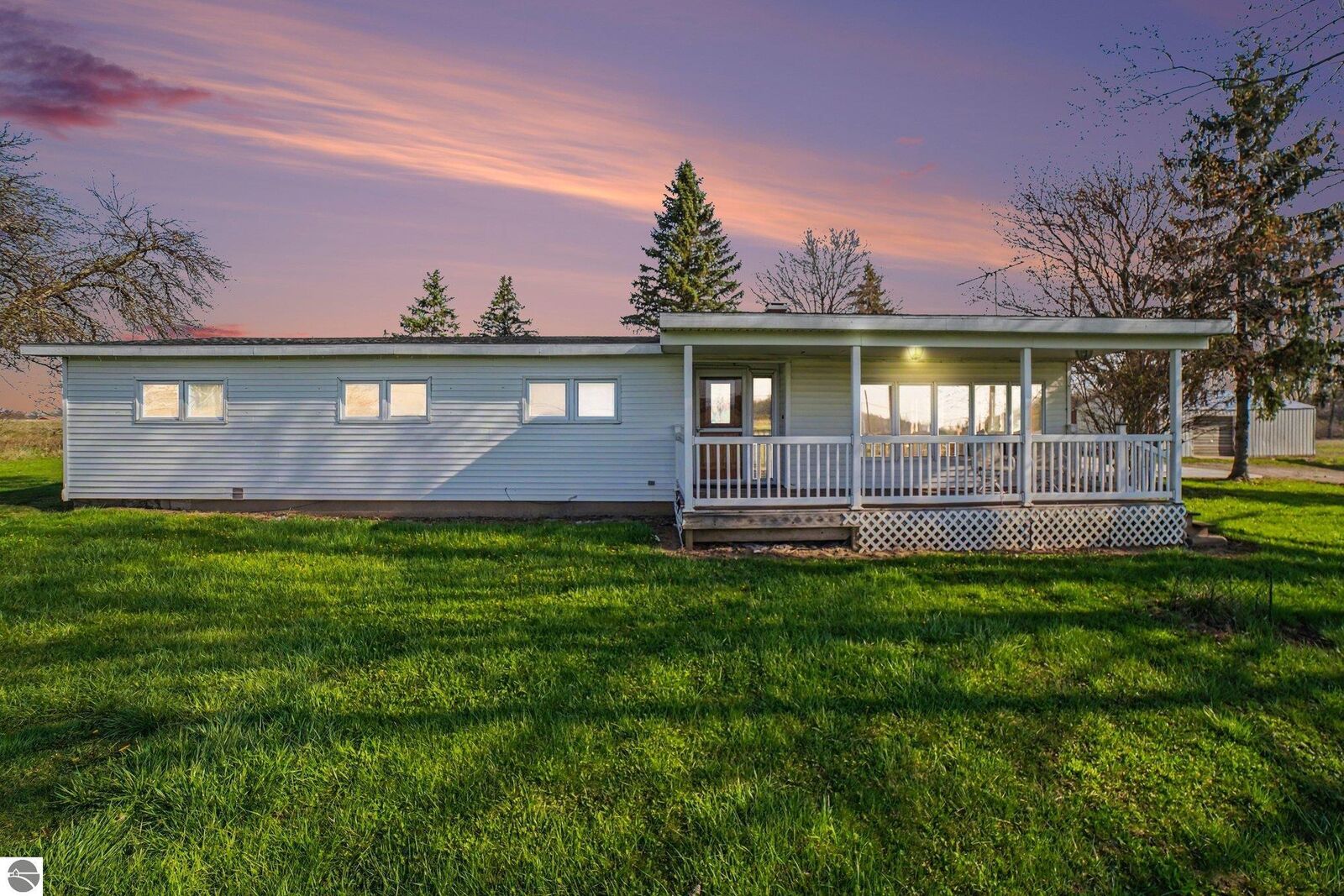 Property Photo:  115 E River Road  MI 48858 