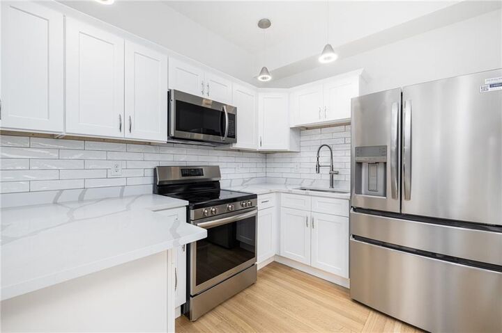 Property Photo:  54 Sutton Street 1  RI 02903 