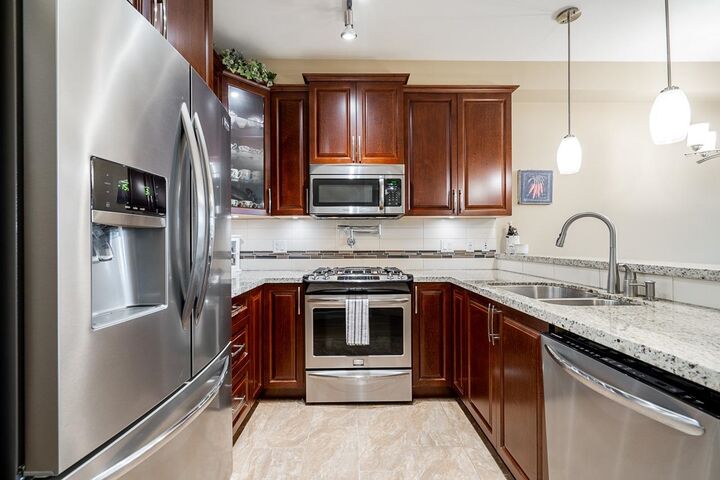 Property Photo:  8157 207 Street 103  BC V2Y 0V4 