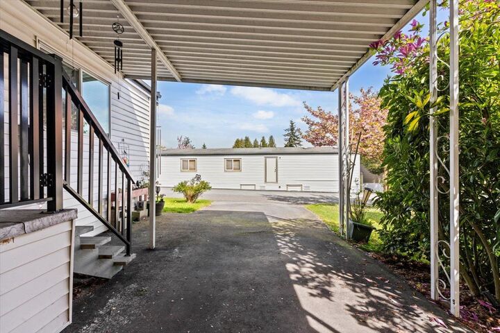Property Photo: 8220 King George Boulevard 3 BC V3W 6E1