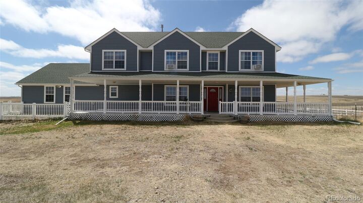 Property Photo:  44166 E Iliff Trail  CO 80102 