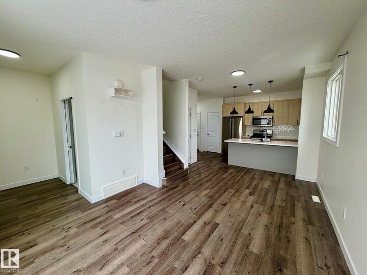 Property Photo: 11234 95 Street NW Upper AB T5G 1K9