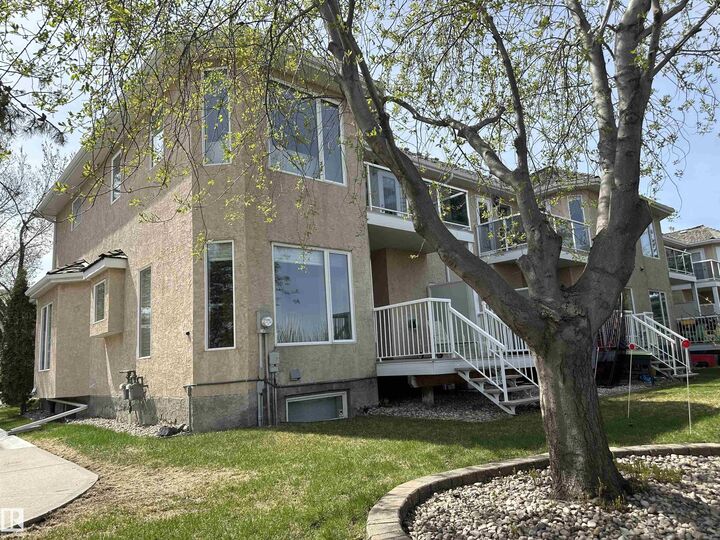 Property Photo: 577 Butterworth Way NW 12 AB T6R 2Y2