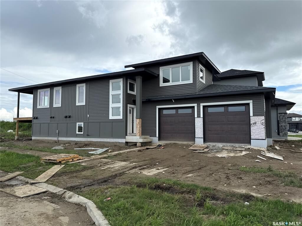 Property Photo: 492 Woolf Bend SK S7W 1E4