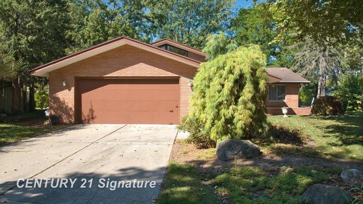 Property Photo:  47 Bretton Place  MI 48602 