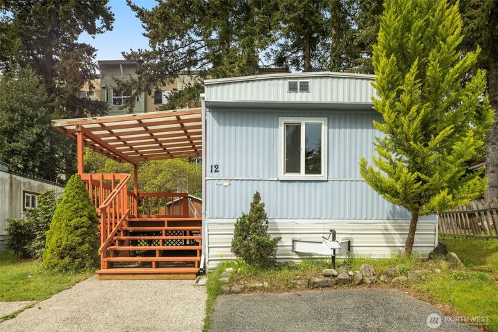 Property Photo:  24222  54th Avenue W 12  WA 98043 