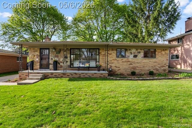 Property Photo:  313 Ely Drive S  MI 48167 