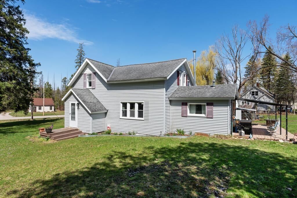 Property Photo:  6419 River Street  MI 49706 