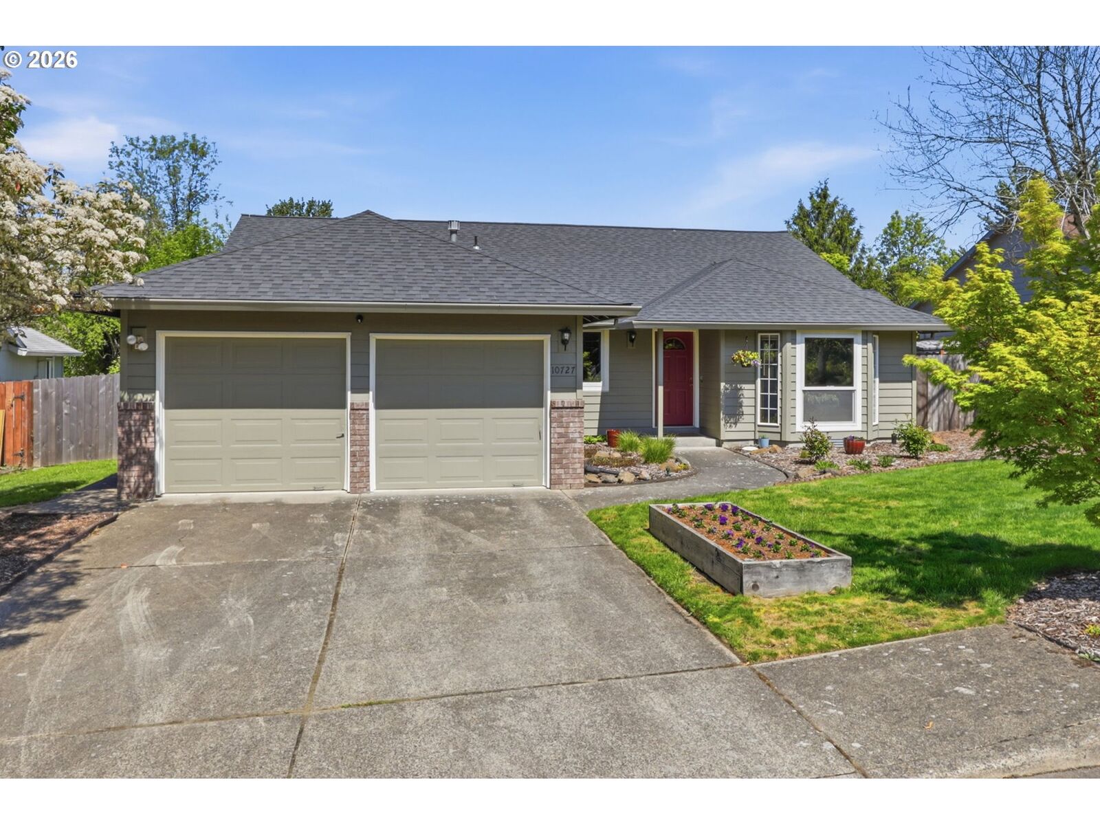 Property Photo:  10727 SE Rex St  OR 97266 