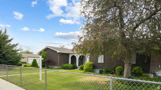 Property Photo:  9556 S David St E  UT 84070 