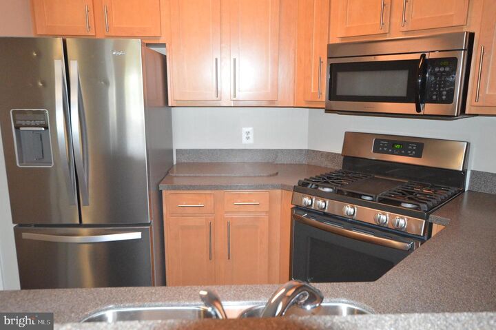 Property Photo:  13058 Autumn Woods Way 301  VA 22033 