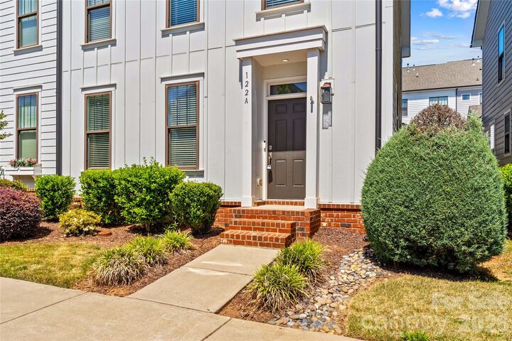 Property Photo:  122 Mint Avenue A  NC 28117 