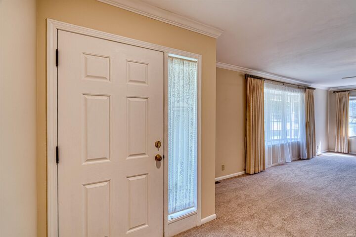 Property Photo:  7001 Monroe Avenue  IN 47715 