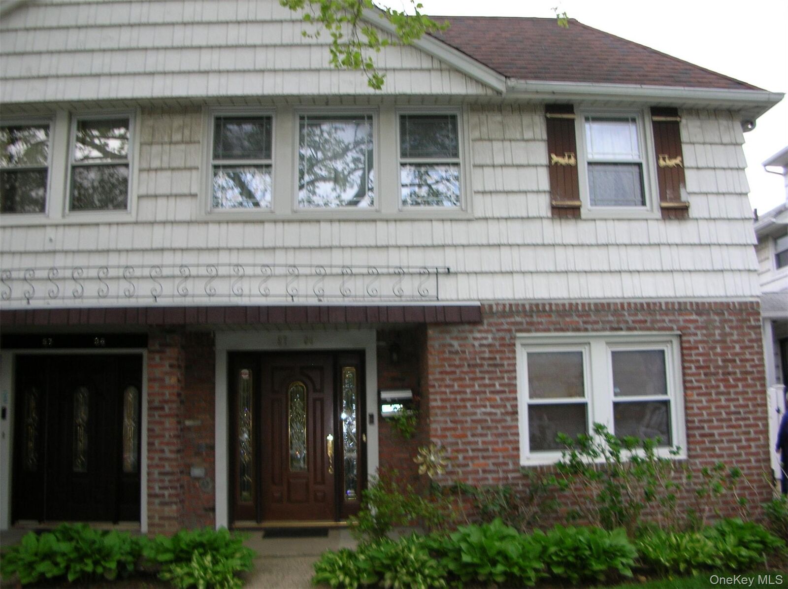 Property Photo:  57-04 Cloverdale Boulevard  NY 11364 