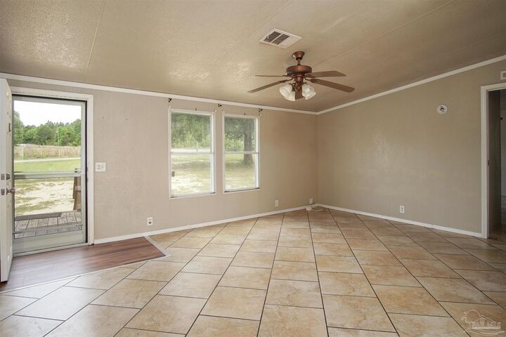 Property Photo:  5180 Phoenix Dr  FL 32583 