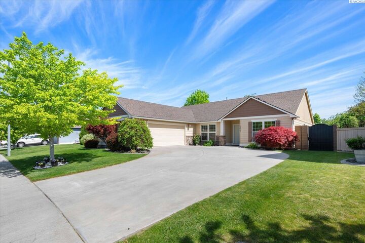Property Photo:  5817 W 17th  WA 99338 