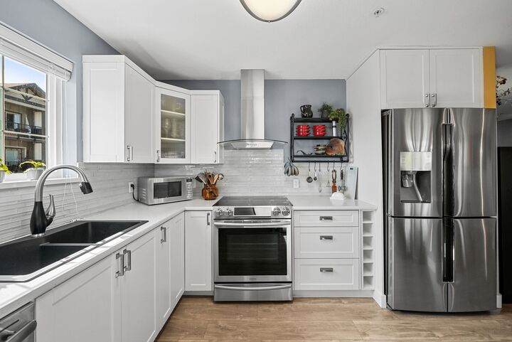 Property Photo: 22022 49 Avenue 406 BC V3A 3R9