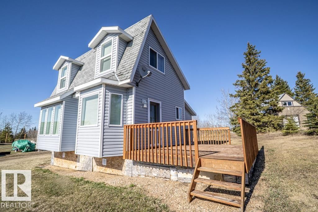 Property Photo:  238, 57201 Range Road 102  AB T0A 3A0 