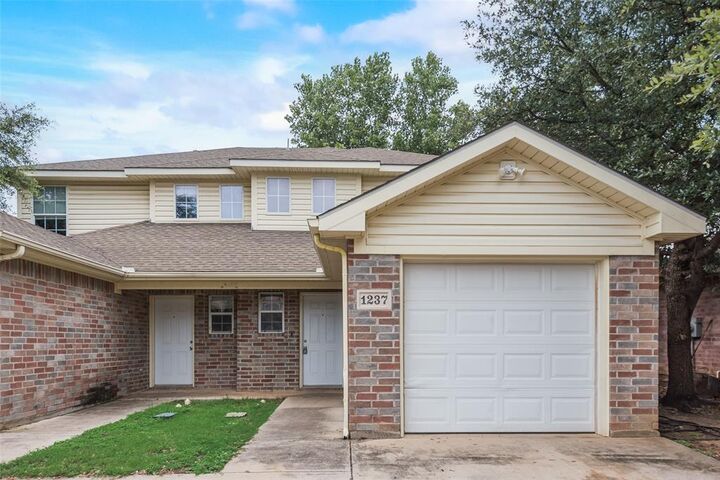 Property Photo: 1233 &Amp 1237 Village Garden Drive TX 76020
