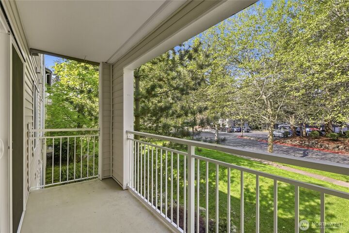 Property Photo:  12303  Harbour Pointe Boulevard W204  WA 98275 