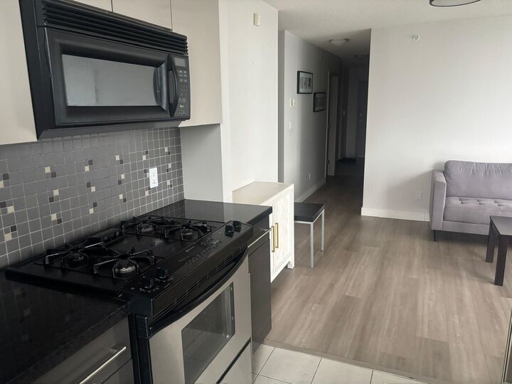 Property Photo:  1408 Strathmore Mews 2702  BC V6Z 3A9 