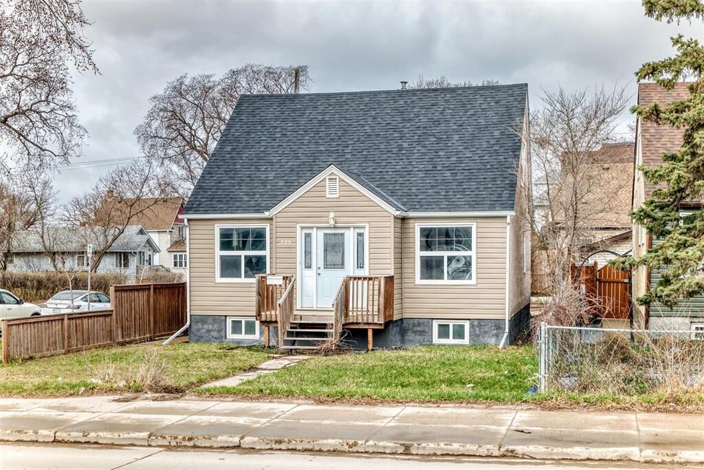 Property Photo:  348 Henderson Highway  MB R2L 1M8 