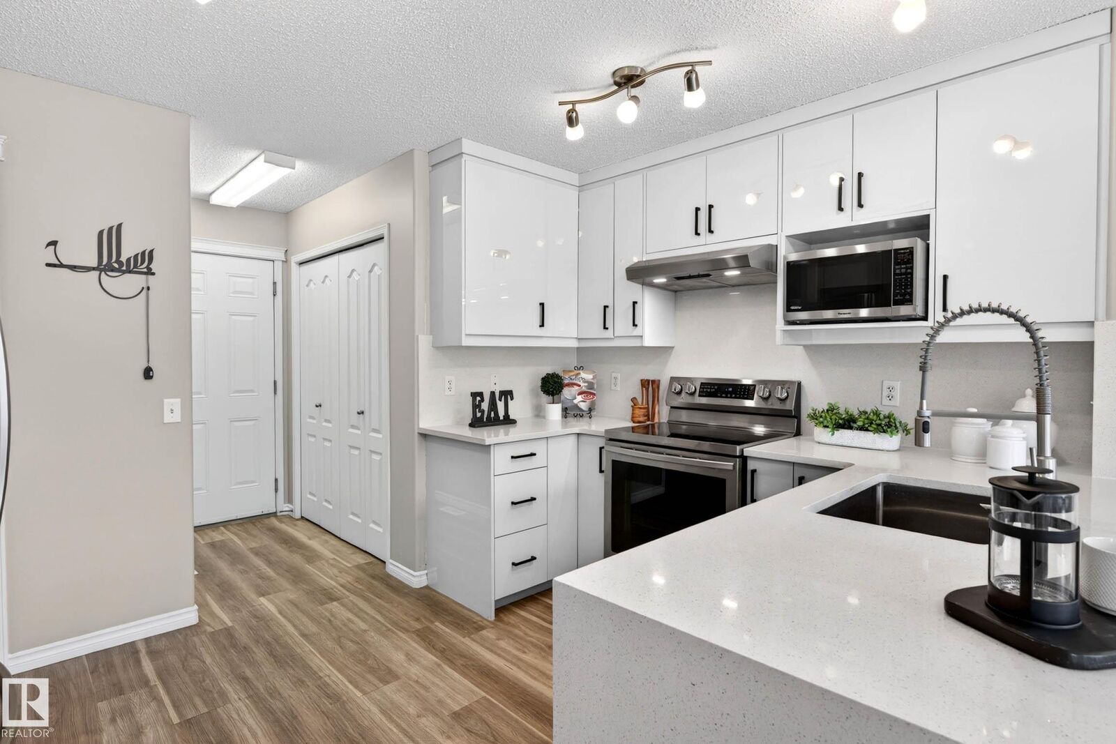 Property Photo:  7723 7A Avenue SW  AB T6X 0A2 