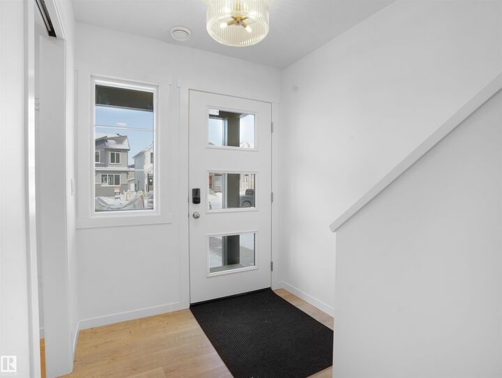 Property Photo: 2034 Marquis Way NE AB T5Y 3K7