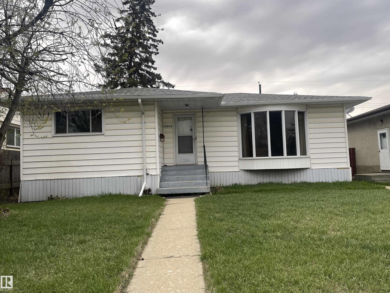 Property Photo:  13804 132 Avenue NW  AB T5L 3R8 