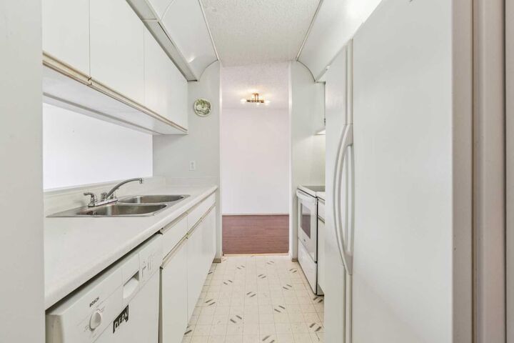 Property Photo:  10 Dover Point SE 418  AB T2B 3J8 