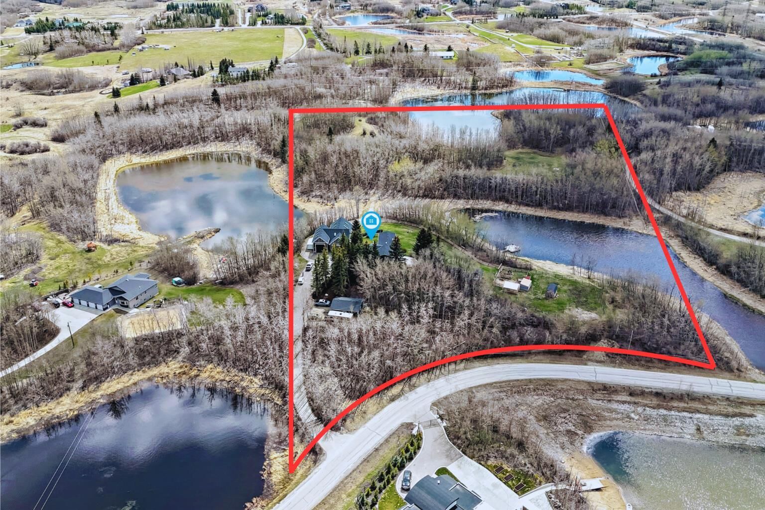 Property Photo:  24185 Meadow Drive  AB T3R 1A7 