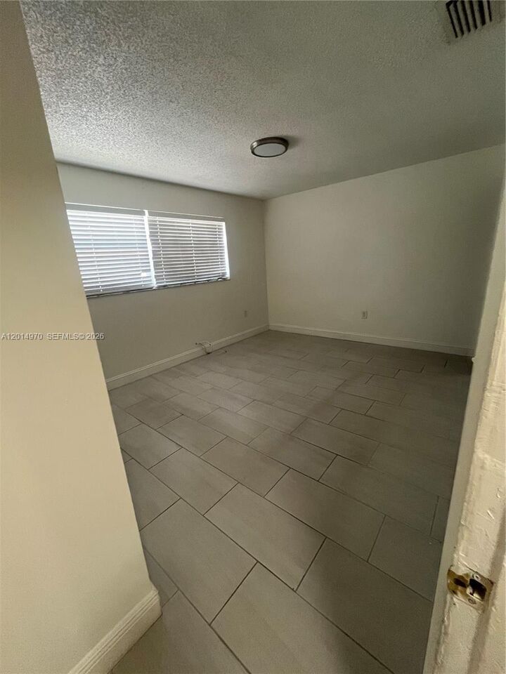 Property Photo:  15609 SW 73rd Cir Ter 8-12  FL 33193 