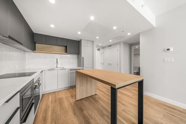 Property Photo:  567 Emerson Street 1507  BC V6J 0M8 