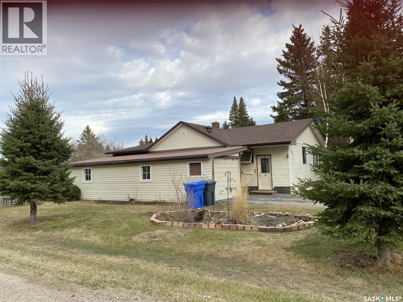 Property Photo:  515 + 511 Springs Avenue  SK S0A 3V0 