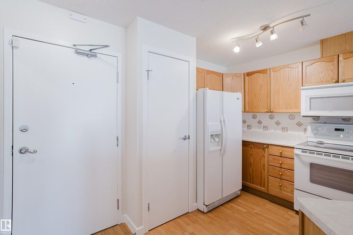Property Photo:  4312 139 Avenue NW 201  AB T5Y 3J4 